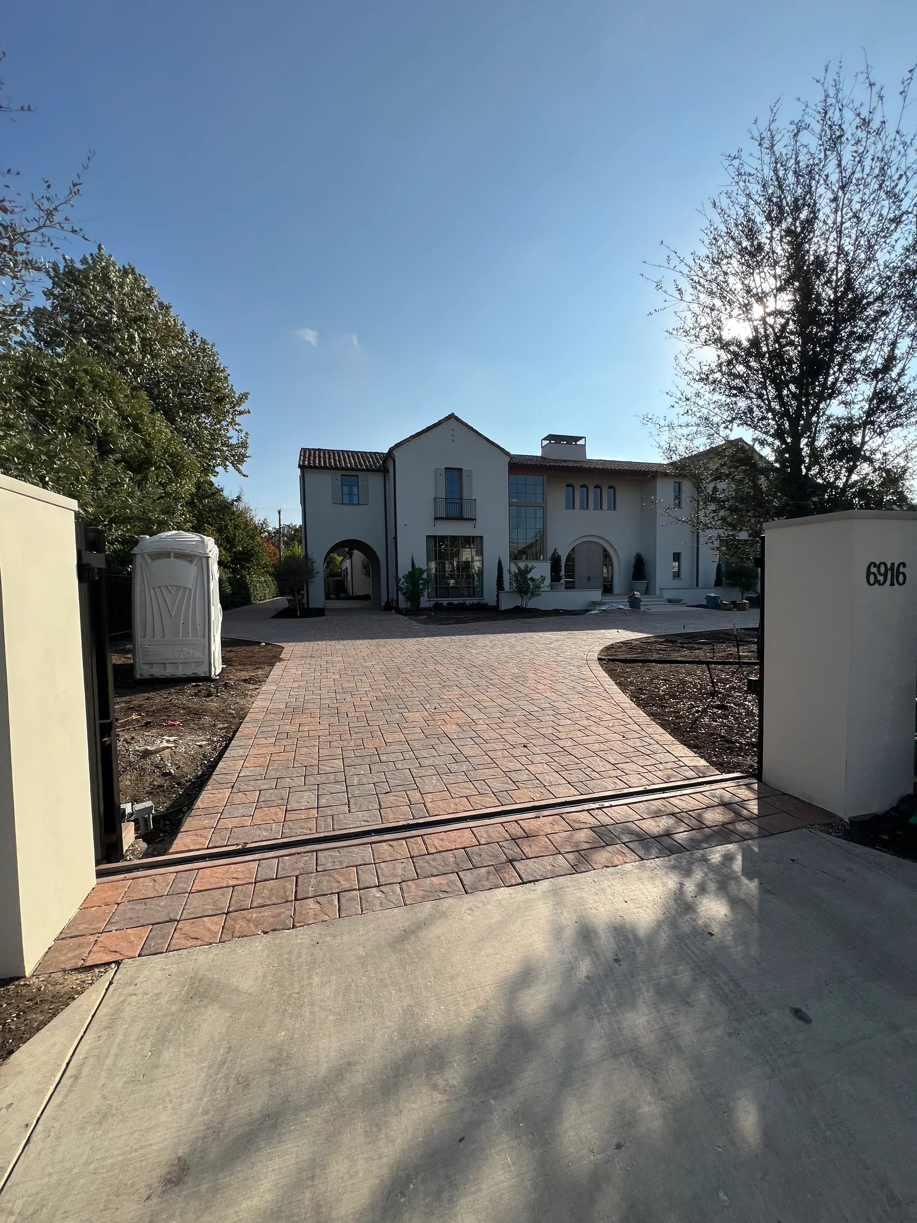 Completed residential brick-paver driveway and front entry